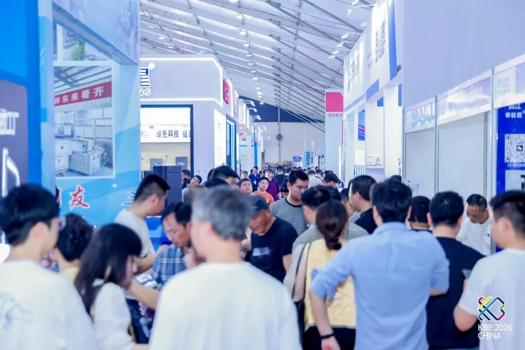 Busy aisles and exhibitor stands at a past edition